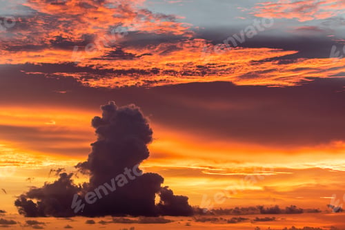 Preview: Majestic colorful tropical sunset. Amazing red, orange, pink clouds. Tropical background.