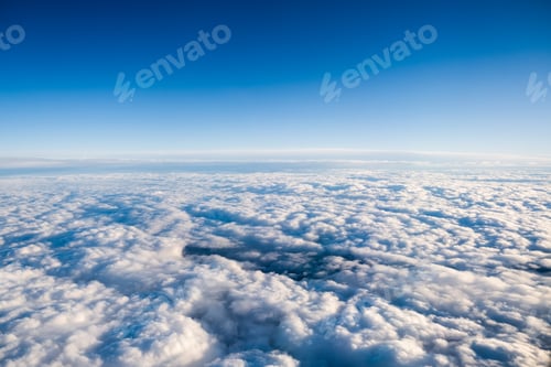 Preview: View from the plane to the clouds and blue sky