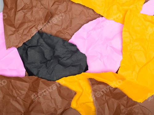 Preview: Vibrant collage of crumpled paper scraps in various colors, including brown, pink, black, and yellow