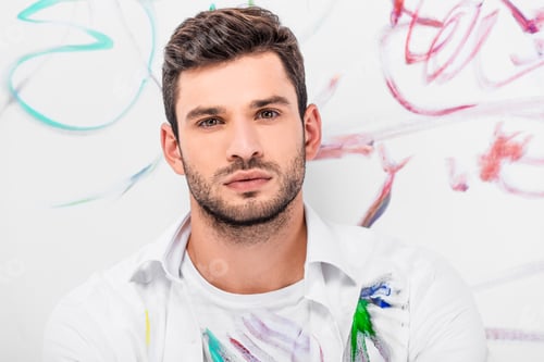 Preview: close up of adult man in total white near painted wall