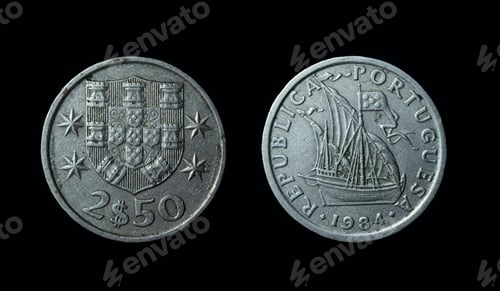 Preview: Closeup of Portugese Escudo coins on a black background