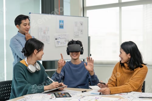 Preview: Diverse development team testing virtual reality headset, brainstorming on augmented reality