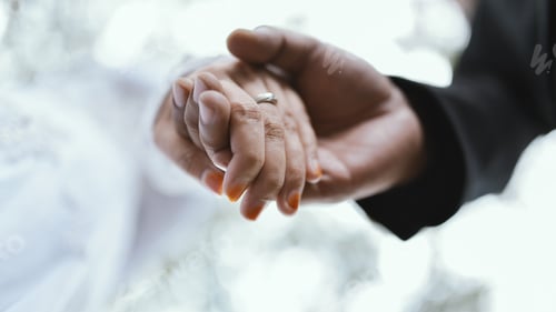 Preview: Married couple holding hand