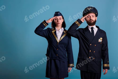 Preview: Woman and Man Saluting Wearing Pilot Costumes