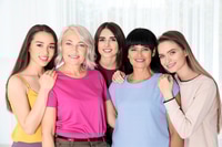 Preview: Smiling Women Posing Together Indoors with Natural Light