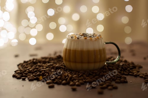 Preview: Cozy scene: latte with festive toppings, coffee beans, and bokeh lights creating a warm atmosphere.