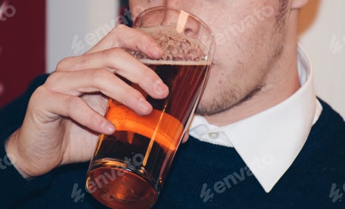 Preview: A young man drinking beer