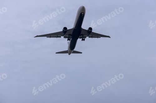 Preview: Jet plane seconds before landing on blue sky on a sunny day