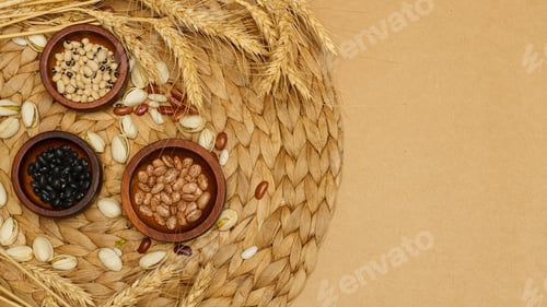 Preview: Flat lay of healthy grains concept, Beans in wooden bowl pistachios and wheat on brown background