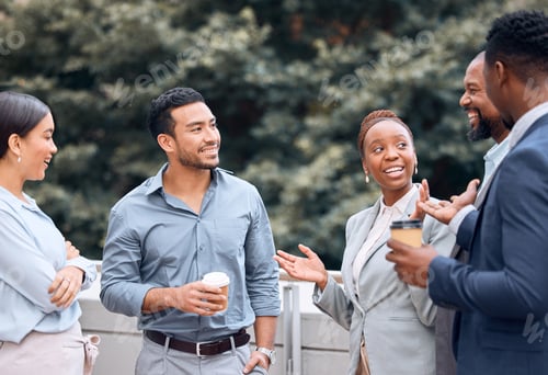 Preview: Shot of a group of businesspeople outside having coffee and conversation