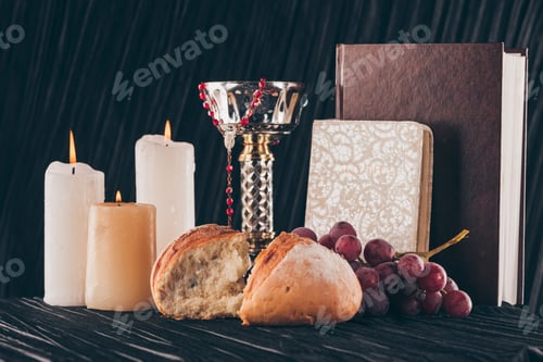 Preview: candles, chalice, holy bible, bread and grapes for Holy Communion