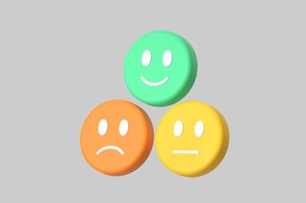 Preview: Three circular objects with facial expressions.