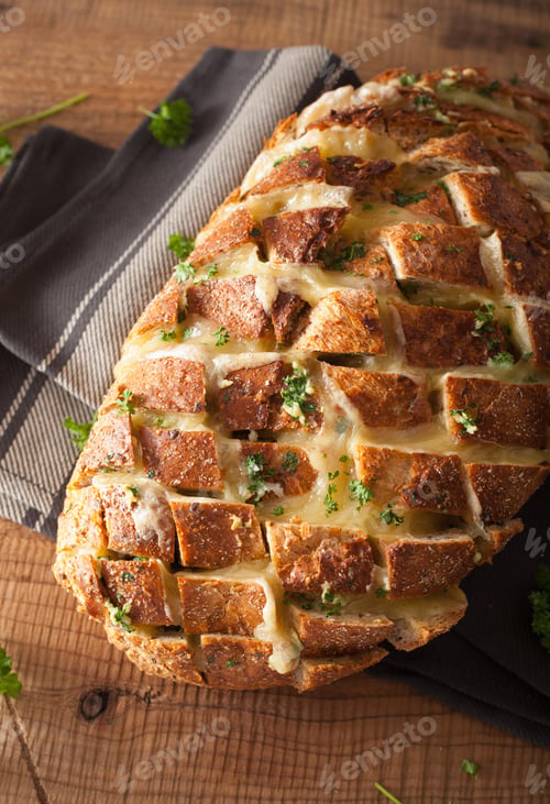 Preview: baked party bread with melted cheese butter herbs
