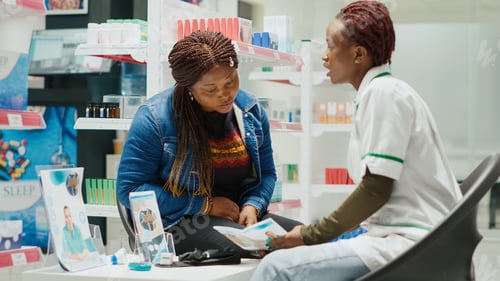 Preview: Health specialist giving medical advice and pills to girl