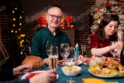 Preview: Grandpa at dinner table with family