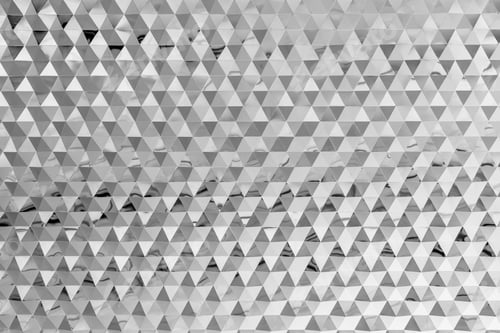 Preview: Abstract background from triangle shape glasses pattern decorated on wall. Modern white wallpaper.