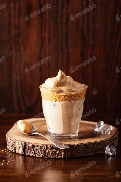 Preview: dalgona coffee in glass. trendy Instant coffee whipped with sugar and hot water