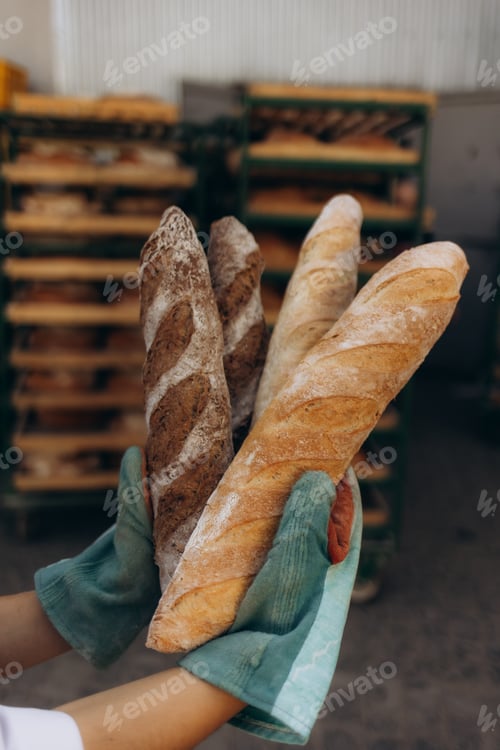 Preview: Baguette and bread. Craft bakery. Homemade pastries. Fresh bread in the bakery. French baguette