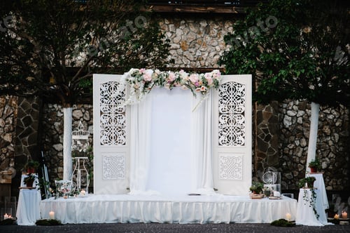 Preview: Wedding decorations in luxury ceremony. Arch for wedding ceremony a is decorated with flowers