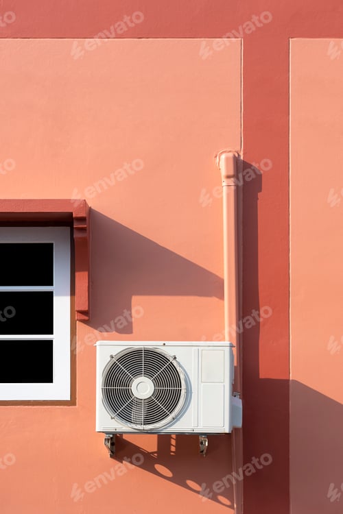 Preview: Air conditioner compressor with pipeline installation near white window on vintage house wall