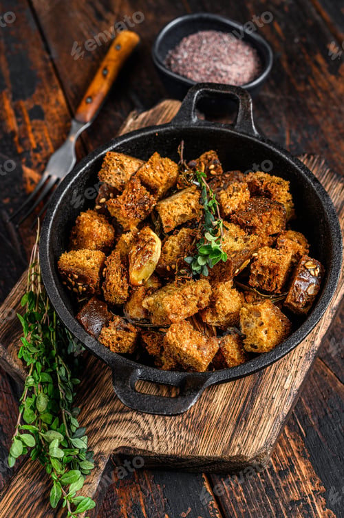 Preview: Crispy Rye Crouton Bread Biscuits. Wooden background. Top view