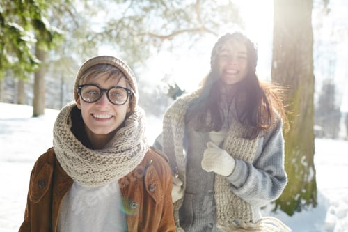 Preview: Carefree Young Women in Winter Forest