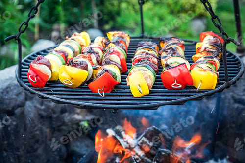 Preview: Hot skewers with meat and vegetables on grill