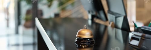 Preview: Reception Bell on Modern Hotel Countertop