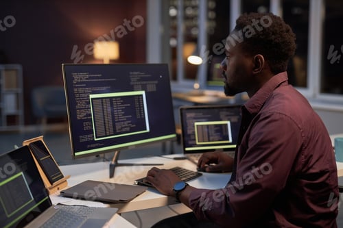 Preview: African American programmer working on computer