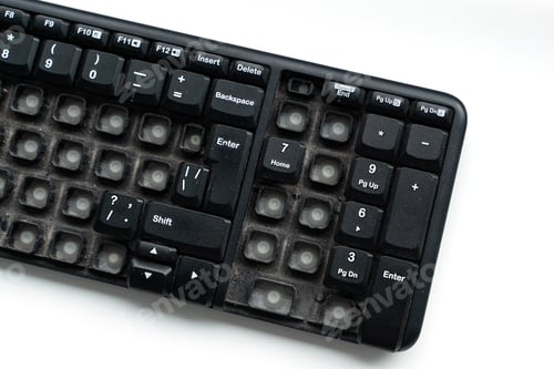 Preview: Close-Up of Old Dusty Keyboard with Missing Keys