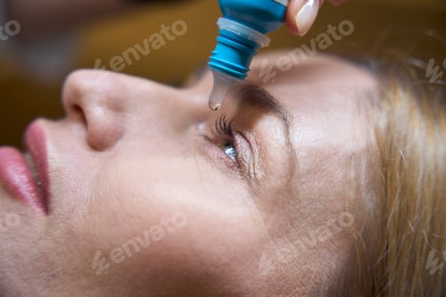 Preview: Blonde woman has special drops put in her eyes
