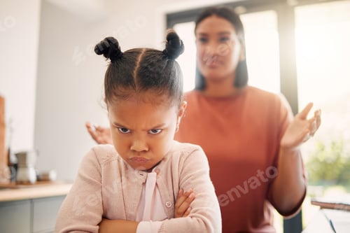 Preview: Angry little girl, unhappy and upset after fight or being scolded by mother, frowning with attitude