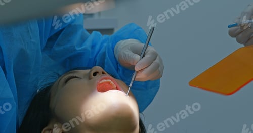 Preview: Woman undergo dental check up in clinic