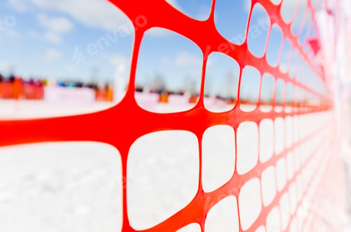 Preview: Safety outdoor slope track fence, winter background. Fence to protect spectators at sports events