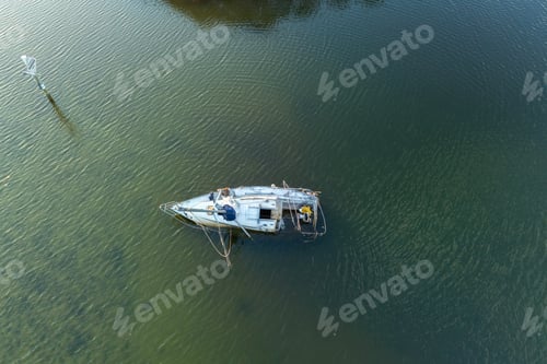 Preview: Capsized sunken sailing boat left forsaken