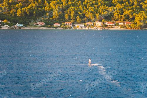 Preview: Photo of a windsurfer windsurfing in Korcula Town, Korcula Island, Dalmatia (Dalmacija), Croatia