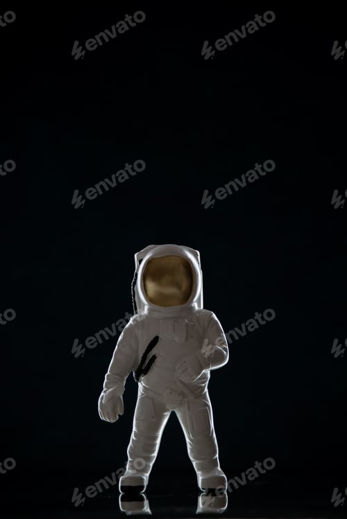Preview: front view of spaceman toy on black background death funeral war palestine