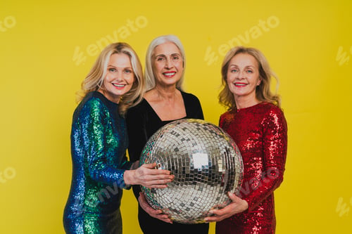Preview: Happy senior women having party
