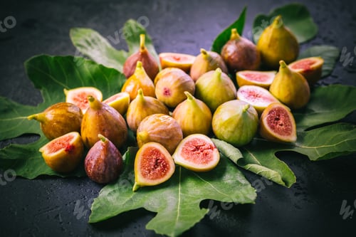 Preview: Harvesting - tasty organic figs on black background