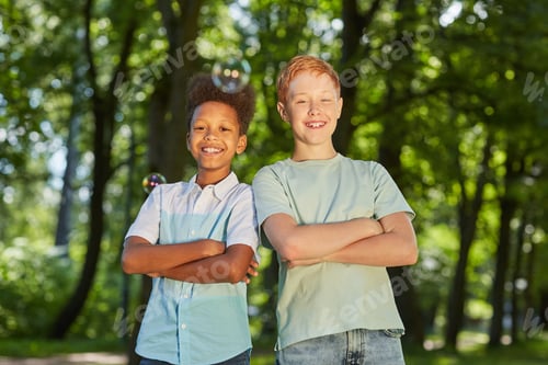 Preview: Two Buddies Posing Outdoors in Park