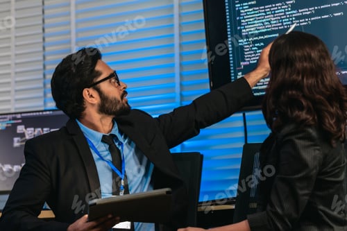 Software Developers Discussing Code