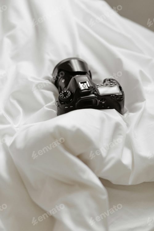 Preview: Camera on a white sheet