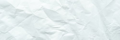 Preview: Textured crumpled white paper background with creases and wrinkles