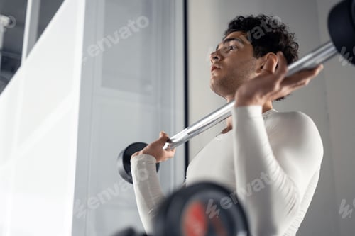 Preview: barbell cardio exercise for biceps body, trainer athlete doing sports in the gym