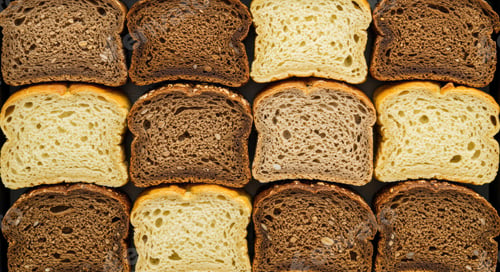 Preview: Whole wheat rye bread slices background texture healthy bakery grain pattern flatlay.