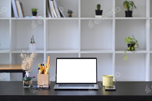 Preview: Front view computer laptop with empty display, coffee up and pencil holder on wooden table.