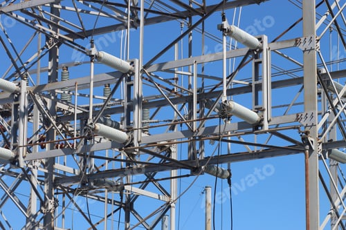 Preview: Steel electrical power grid under a bright blue sky