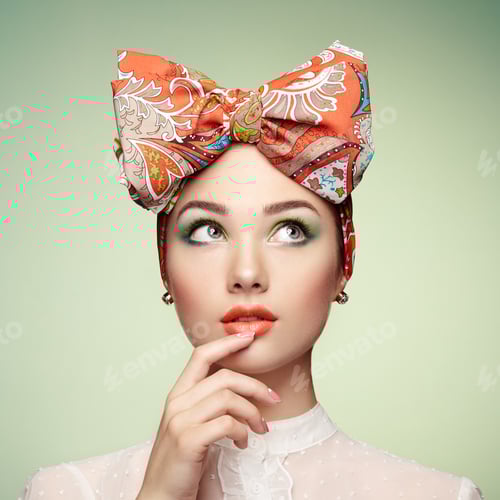 Preview: Portrait of beautiful young woman with bow