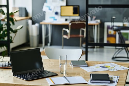 Preview: Workplace of economist or accountant with laptop and documents