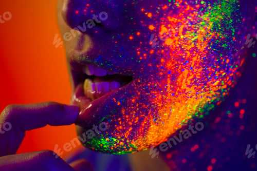 Preview: Fashion model with fluo painting on the face